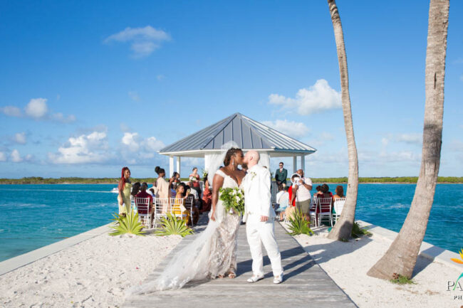 wedding kiss at on boardwalk