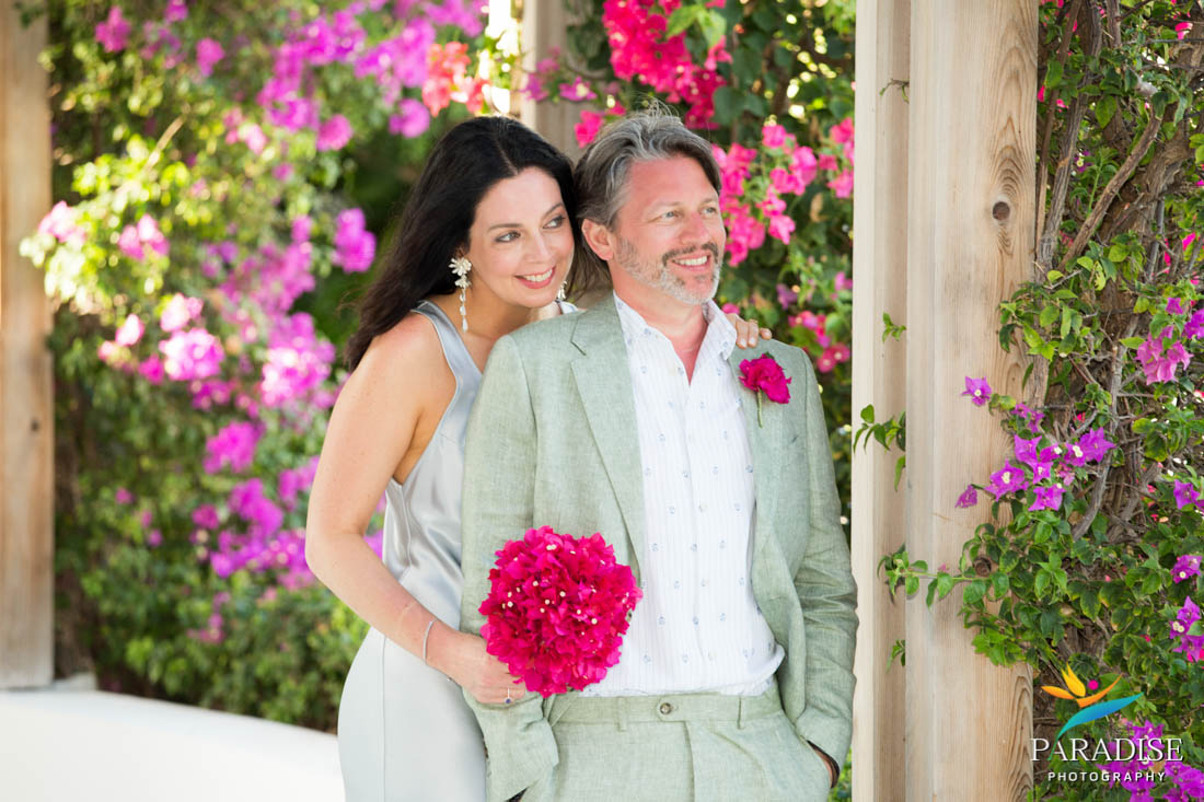 wedding couple with bougainvillea flowers