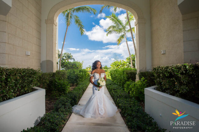 06 West Bay Club Resort Wedding bride in archway