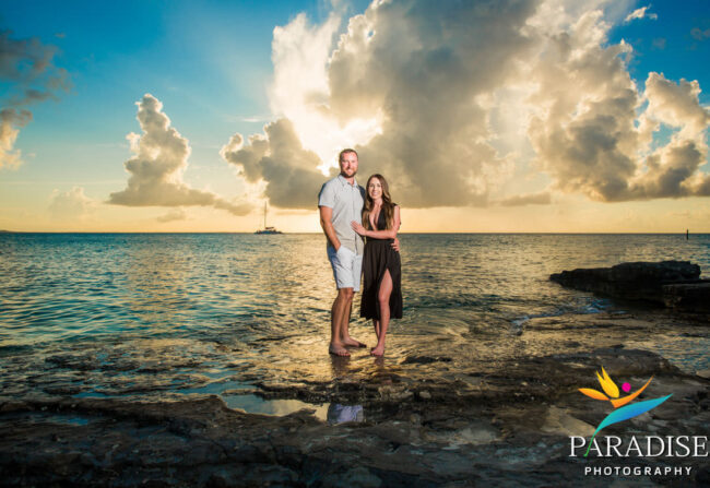couple with dramatic sunset sky