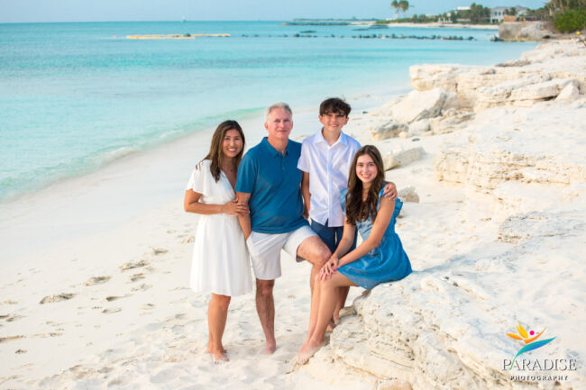 family on a secluded beach