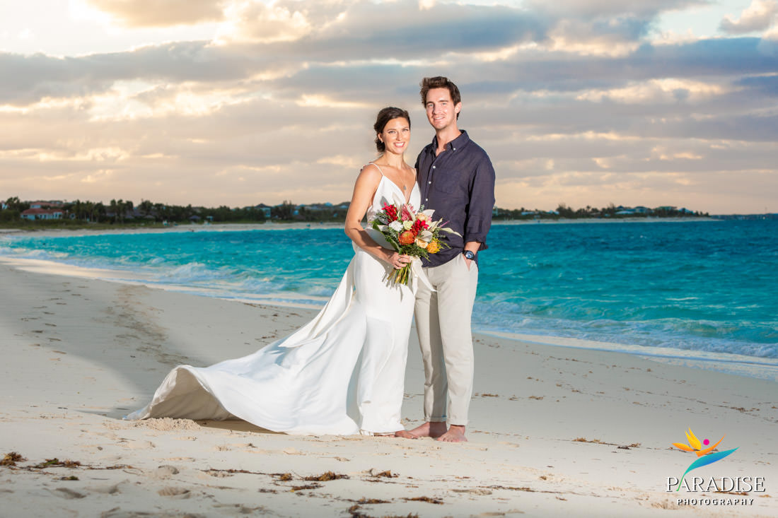 wedding couple on the beach at sunset
