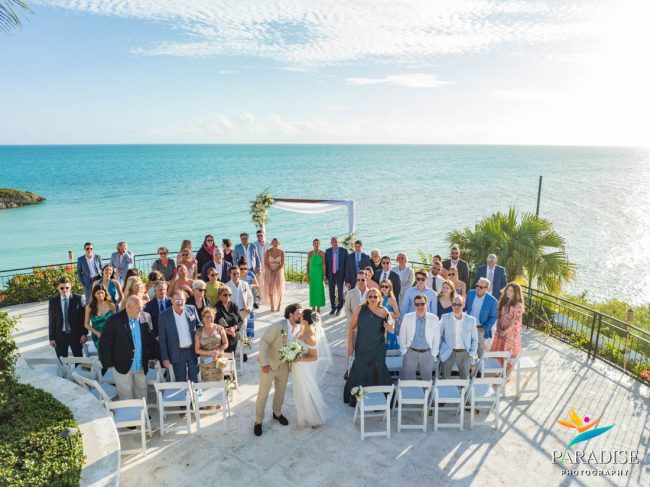 001 Emara Estate Wedding Turks and Caicos drone of wedding ceremony by the ocean