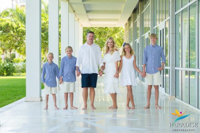 family_photos_ritz_carlton family walking hand in hand at ritz carlton in turks and caicos