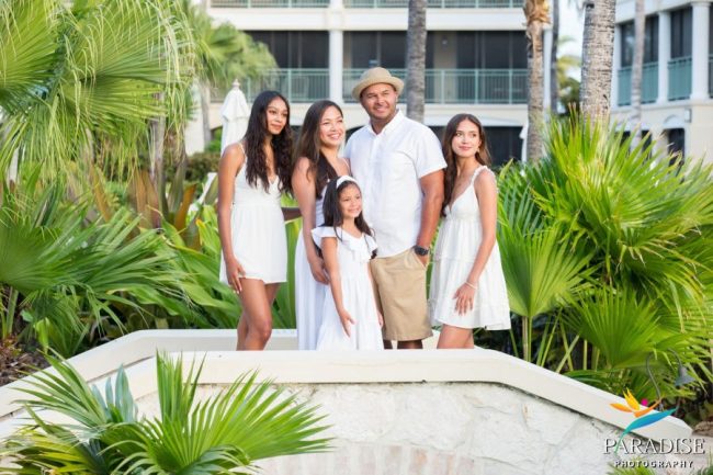 001 family-posing-bridge-palms family-posing-on-bridge-with-palms