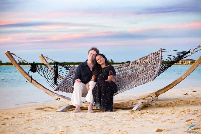 couple-relaxing-hammock-beach-vacation.jpg A beautiful family couple relaxing in a hammock on a serene beach