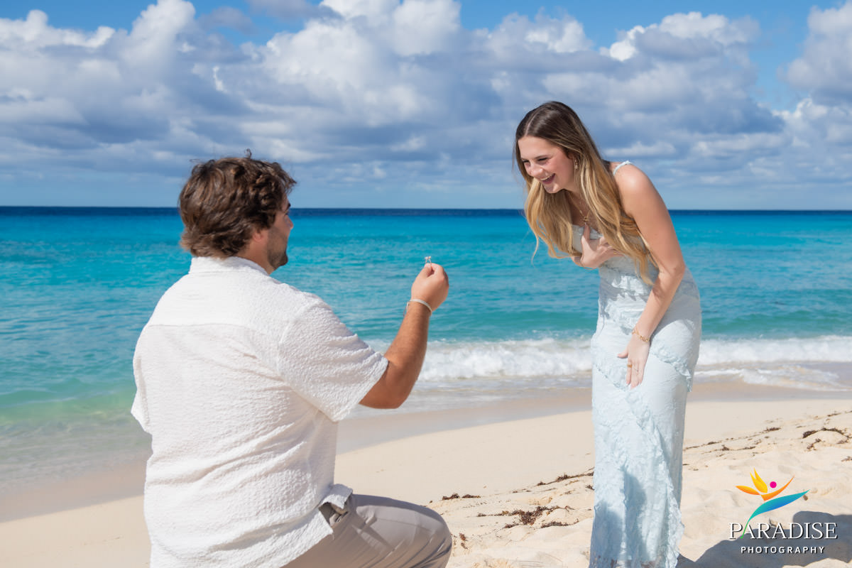 Woman in white dress beach portrait at Grand Turk Island Turks and Caicos engagement photography
