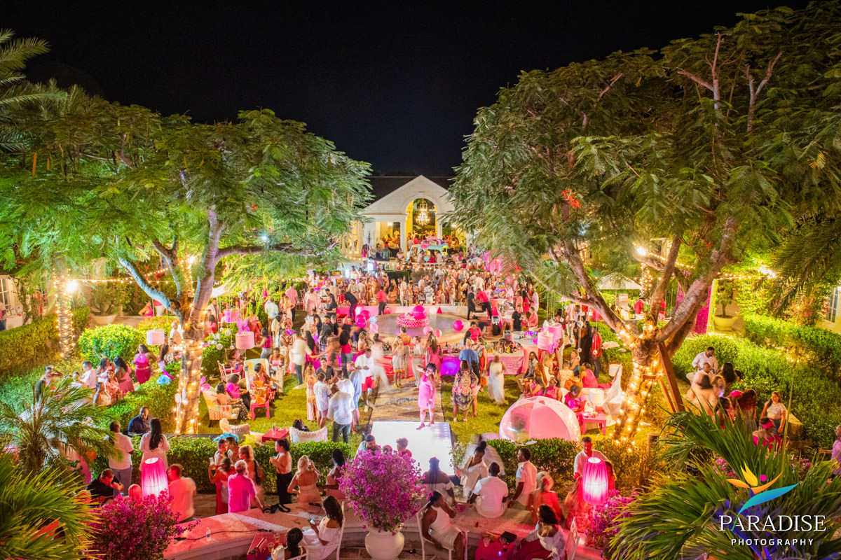 Turks and Caicos event photographer garden party crowd night string lights