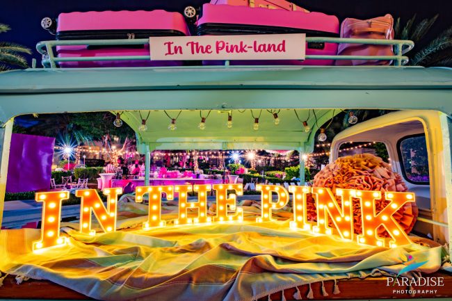 Turks and Caicos event photographer in the pink marquee letters vintage truck