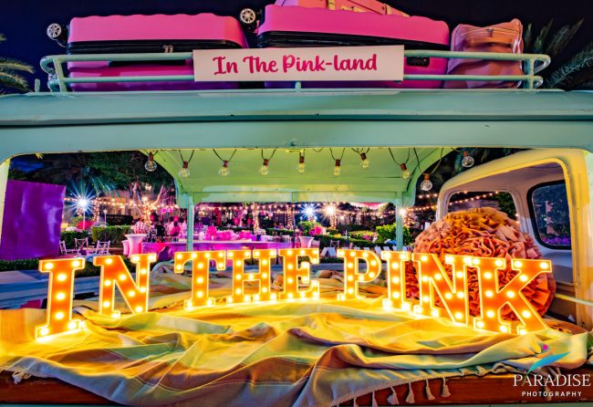 Turks and Caicos event photographer in the pink marquee letters vintage truck