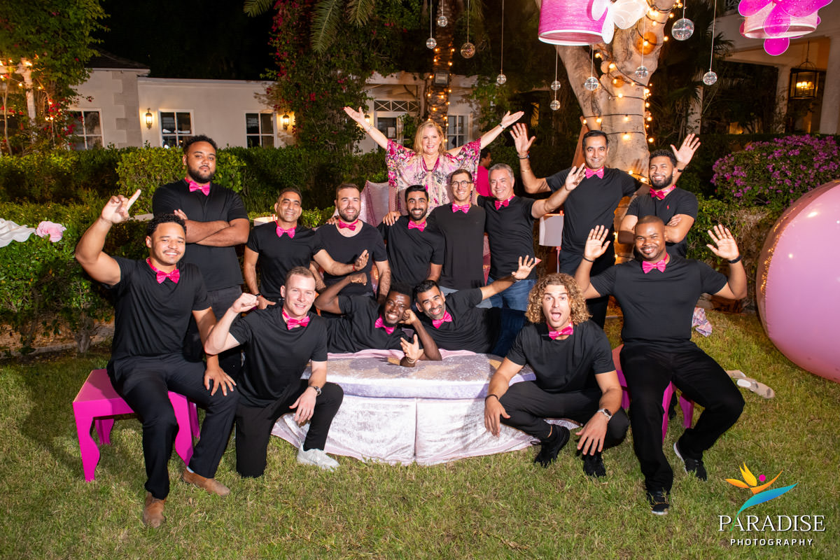 Turks and Caicos event photographer team pink bow ties fun group photo